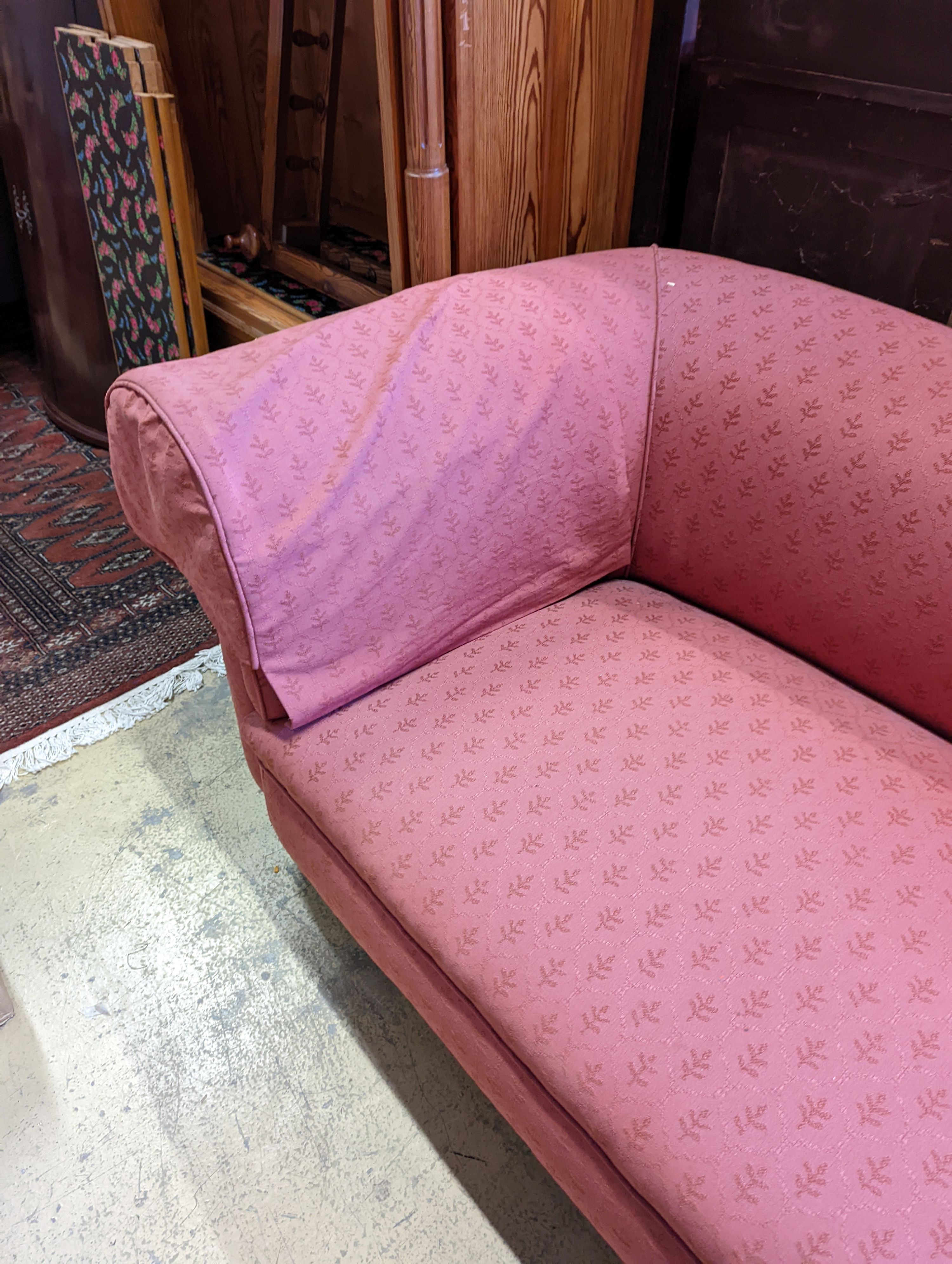 A Victorian red upholstered chesterfield settee, length 202cm, depth 92cm, height 72cm